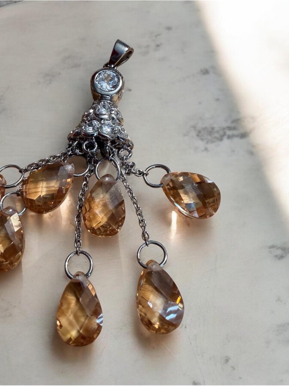 Sterling Silver Pendant with Amber-Brown Faceted Teardrops